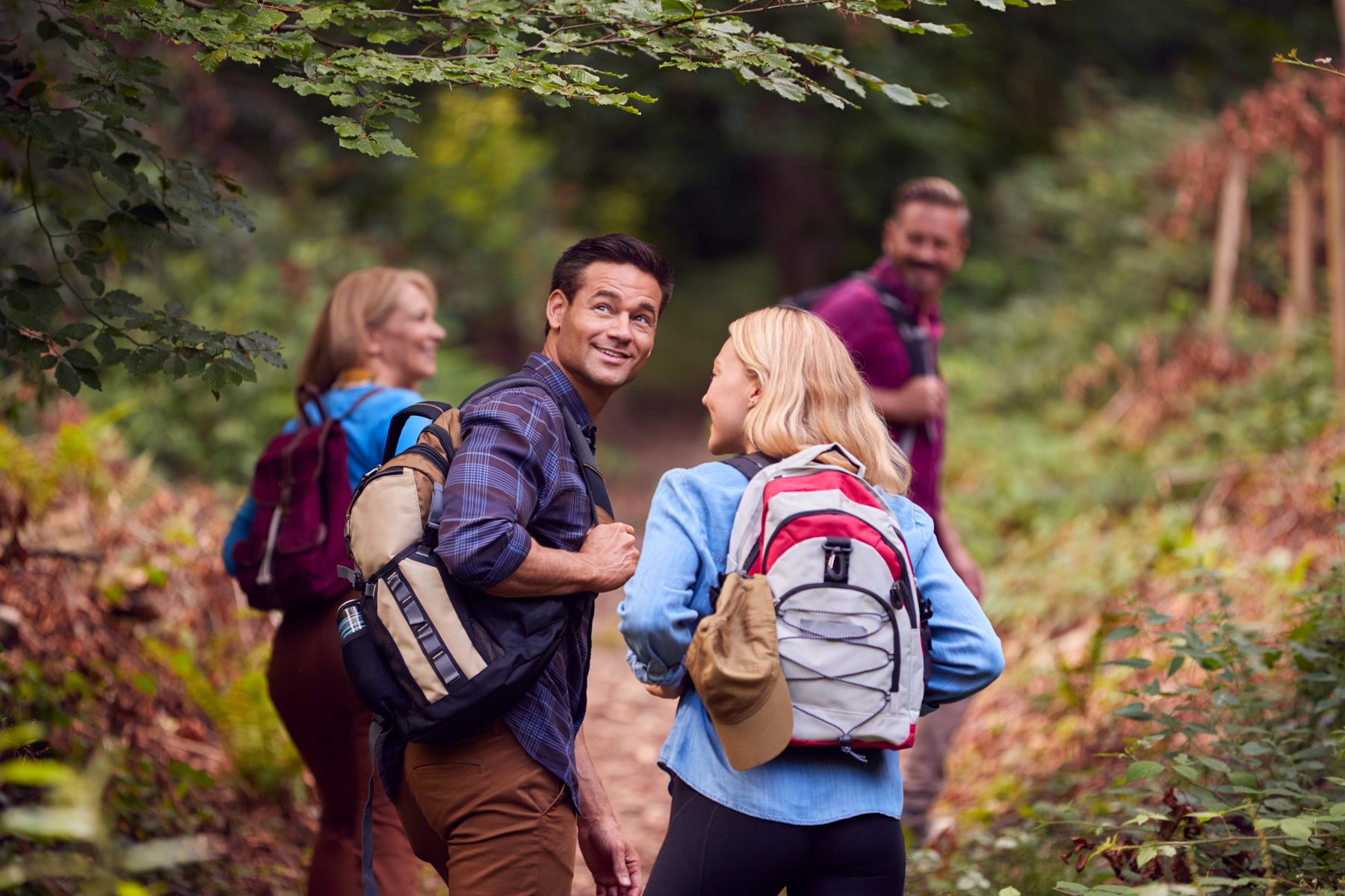 Friends on a forest trail