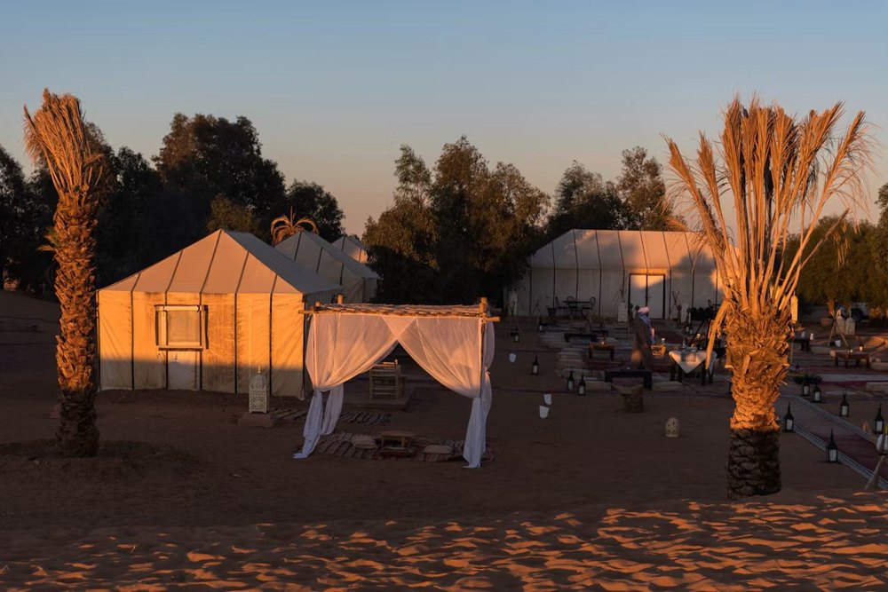 Camp tents at sunset